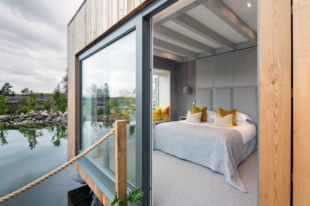 Bedroom of a Spa Suite at Gilpin Hotel & Lake House, Windermere, United Kingdom