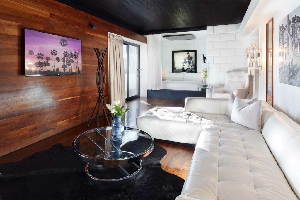 The Marilyn Monroe suite with a large white couch.