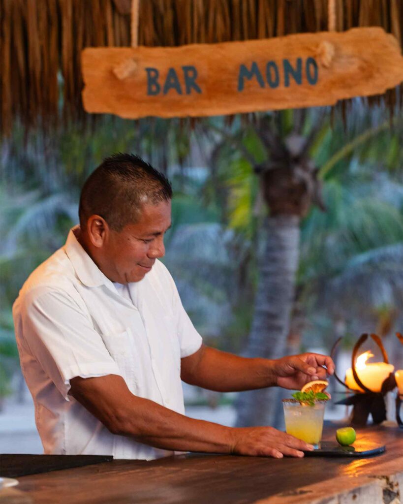 A staff member mixes a cocktail in Costalegre, Jalisco, Mexico