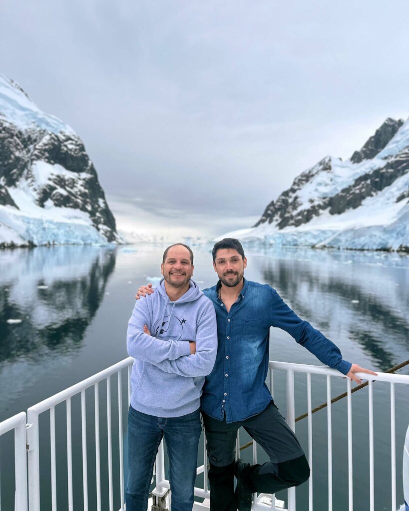 A gay couple during an Antarctica Pride Cruise with AE Expeditions