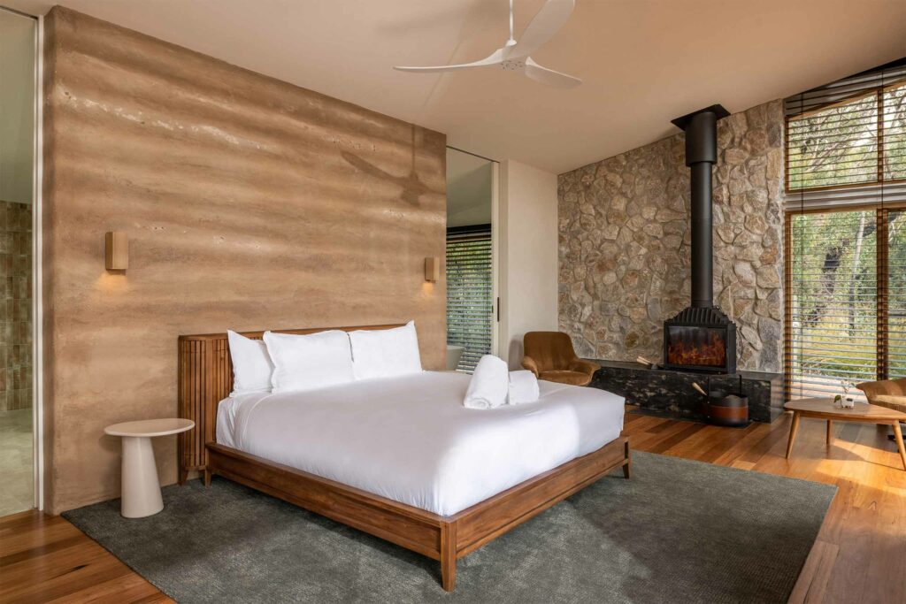 Bed inside a chalet at Chalets at Blackheath, Blue Mountains, Australia