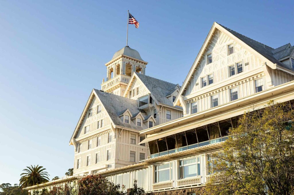 Claremont Club & Spa exterior with an American flag flying.