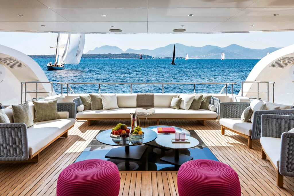 A seating area aboard a CRN yacht by Ferretti Group