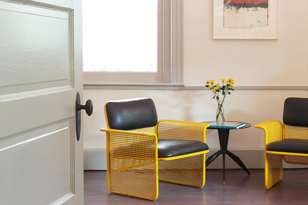 A yellow chair at Hotel Tivoli, Dutchess County, New York, USA