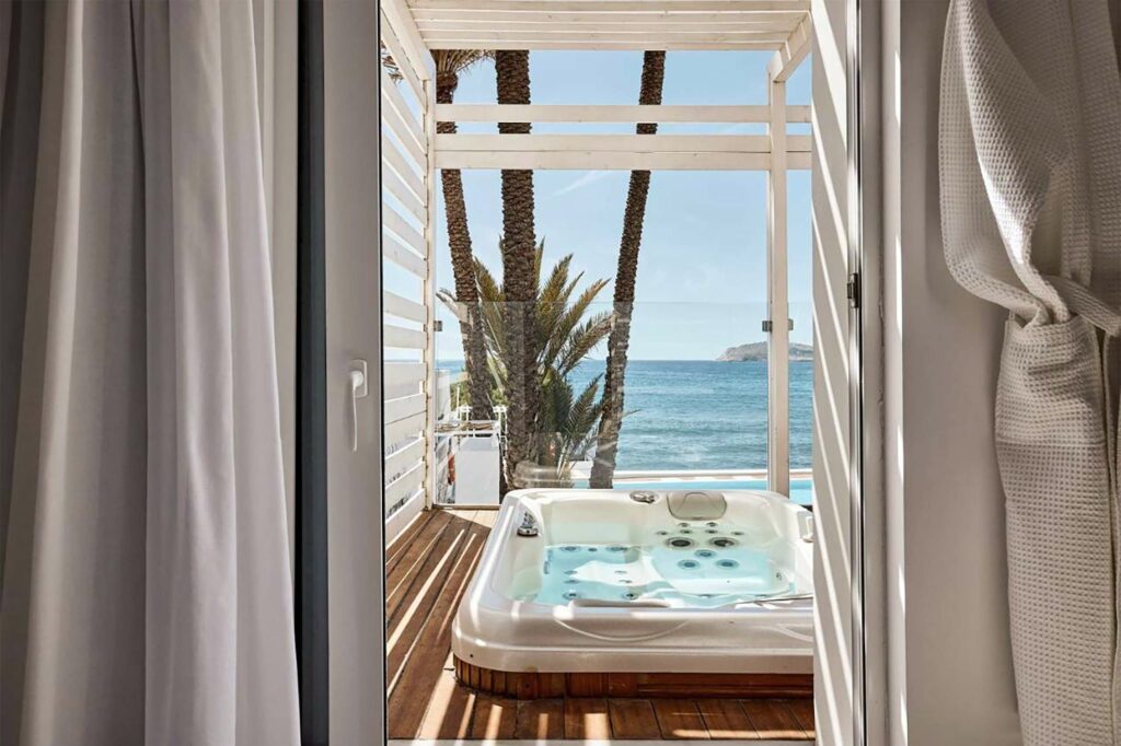 Jacuzzi overlooking the sea at Kantouni Beach Boutique Hotel, Kalymnos, Greece