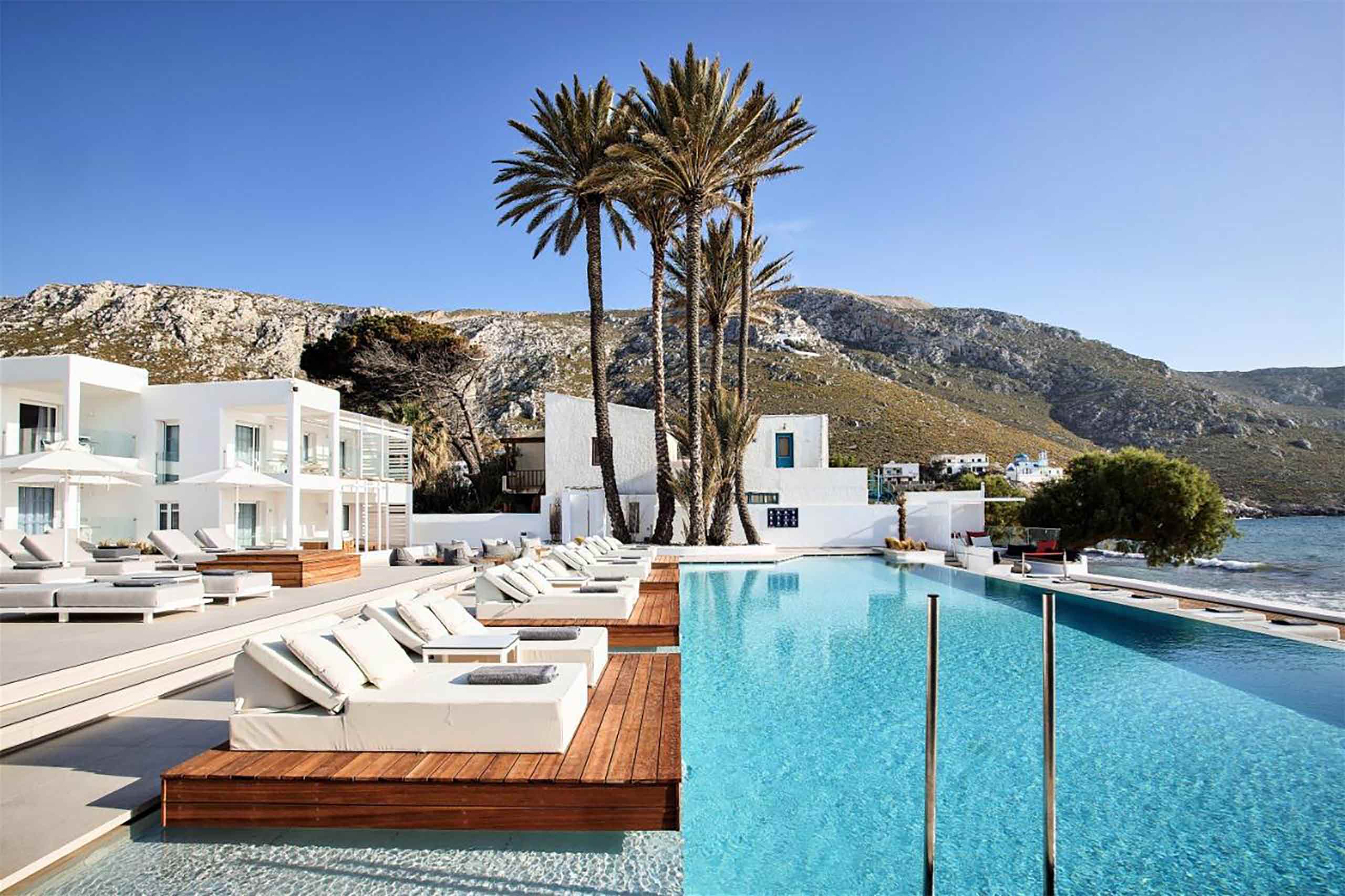 Poolside loungers at Kantouni Beach Boutique Hotel, Kalymnos, Greece