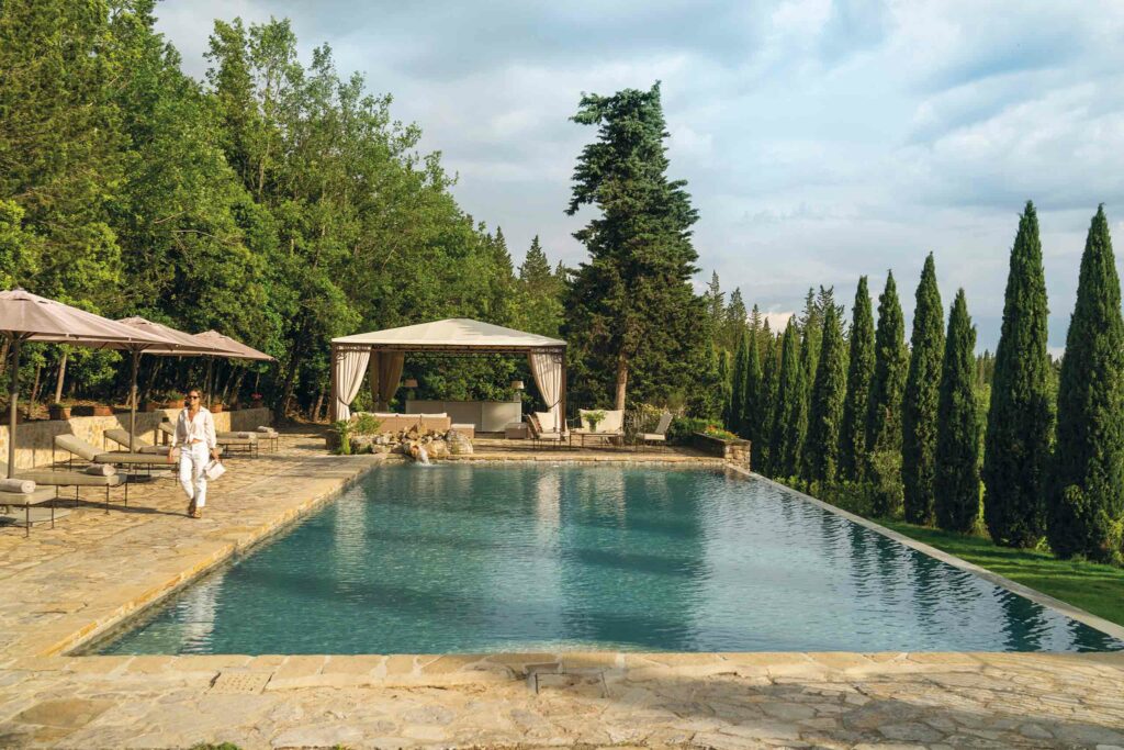 Poolside loungers at Villa Ardore, Tuscany, Italy