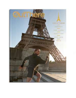 OutThere Paris is turning issue cover with model Koko running past the Eiffel Tower