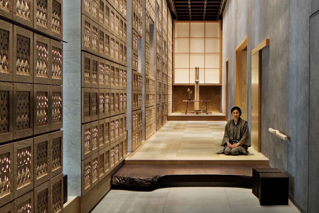 Greeter in lobby of Hoshinoya Tokyo