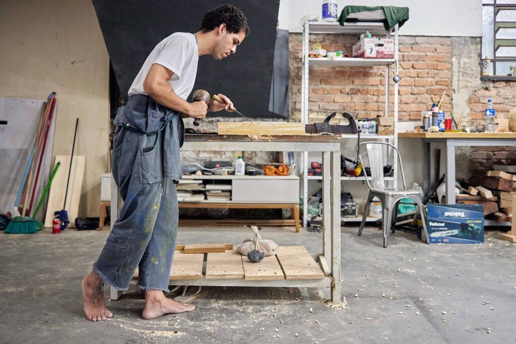 Anderson Borba at work in São Paulo, photographed by Martin Perry