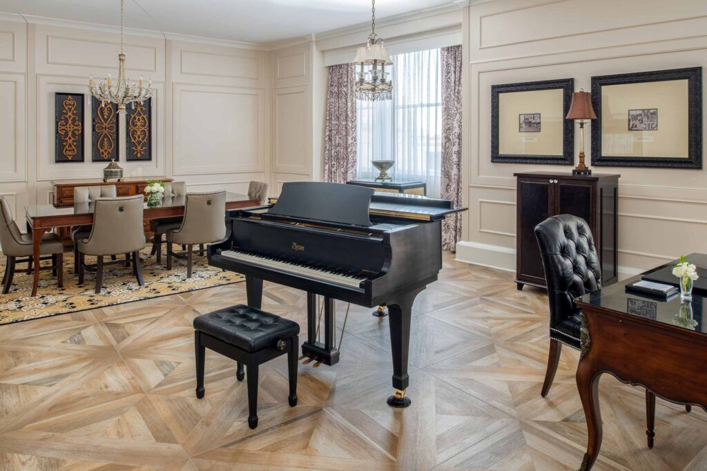 Piano in a Suite at the The Roosevelt New Orleans, A Waldorf Astoria Hotel, New Orleans, Louisiana, USA