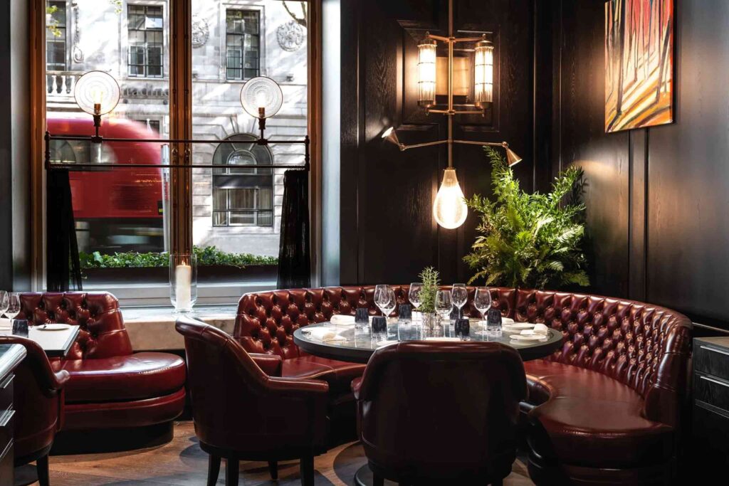 Corner table at Kerridges restaurant with view of double decker bus