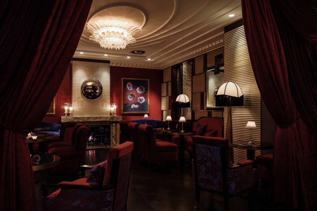 Sumptuous red interiors at Velvet Bar in the British capital