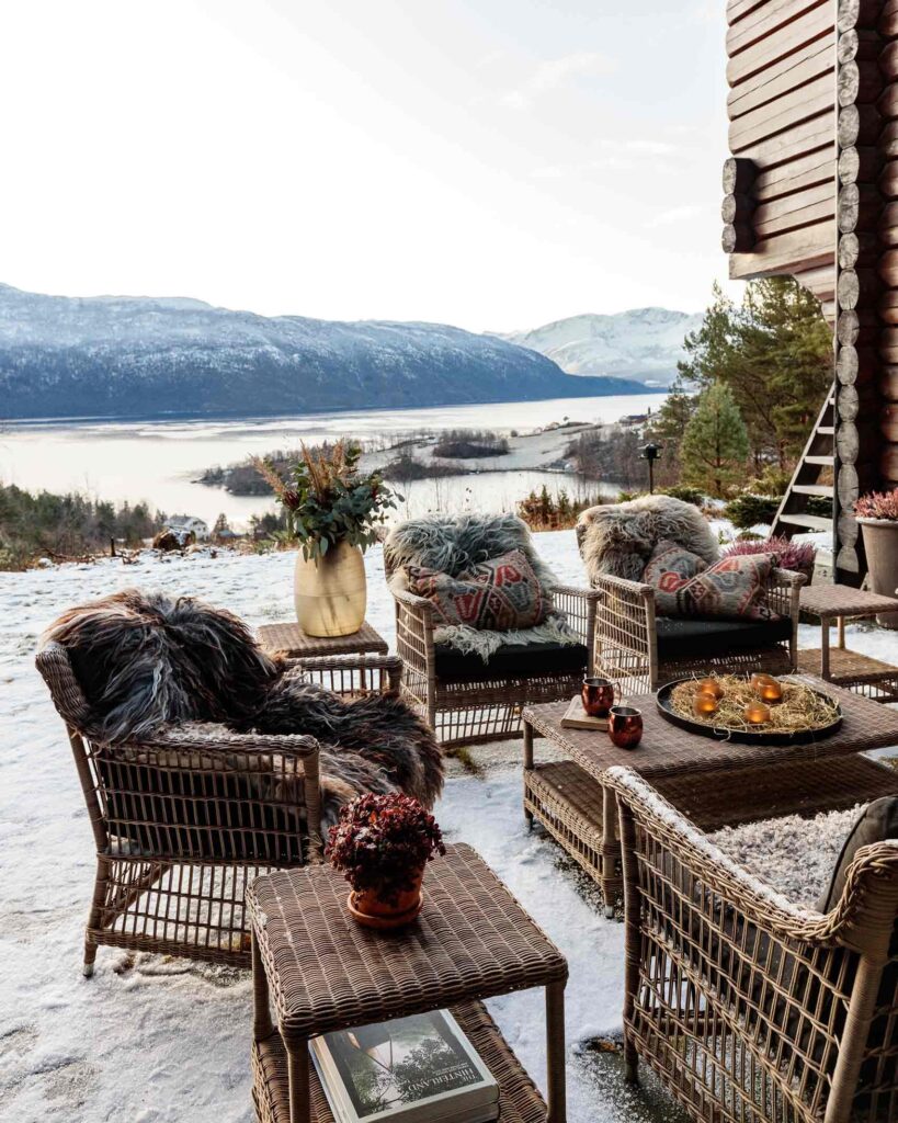 Outdoor seating with view over a fjord in the Skodje region of Norway