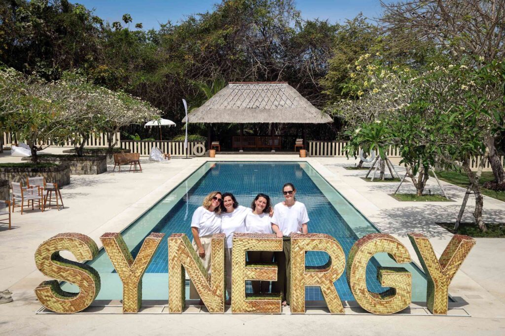 The people behind Synergy The Retreat Show 2024 pose for a picture at REVIVO Wellness Resort