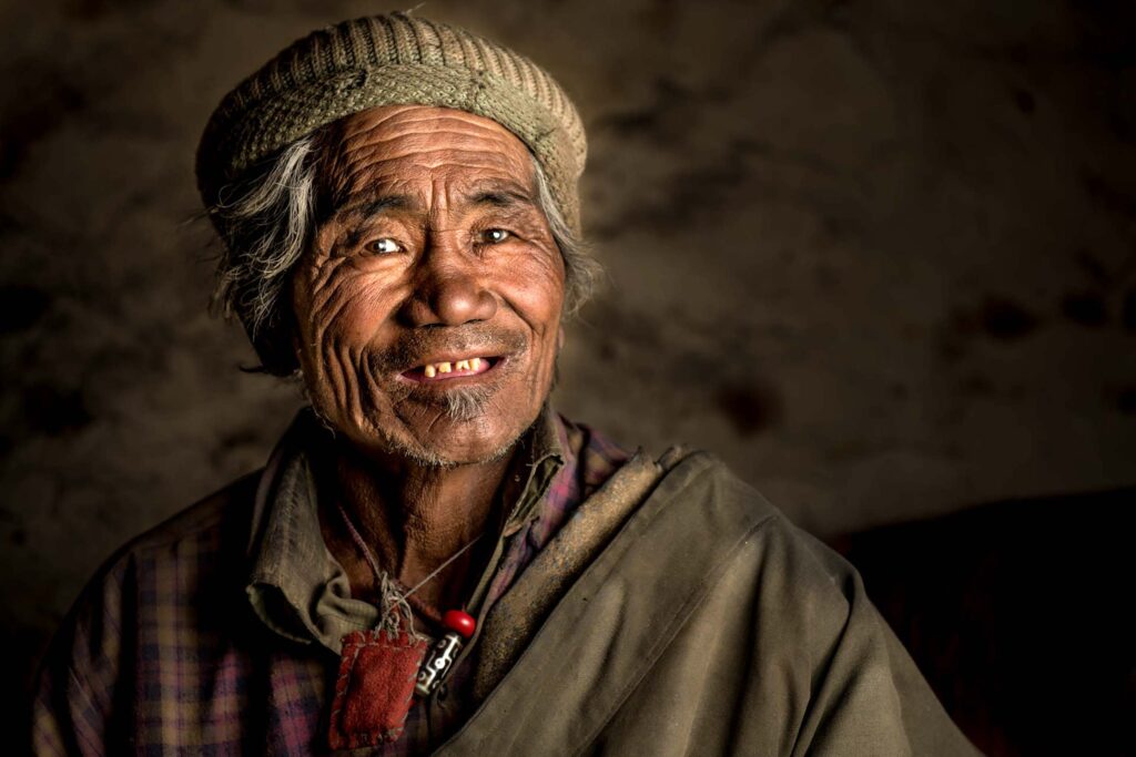 A villager smiles for the camera in Ladakh, India, during a Journeys With Purpose trip