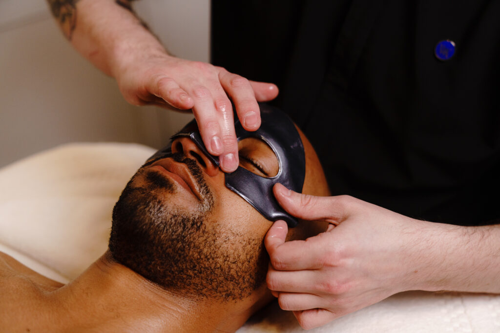 Man receiving eyemask treatment at the Waldorf Astoria Spa Chicago