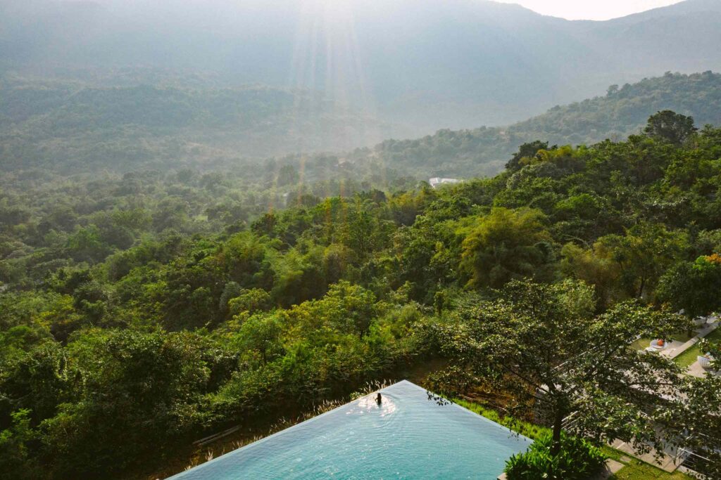 Outdoor pool at Dharana at Shillim, India, an answer to the question of where to travel in 2025