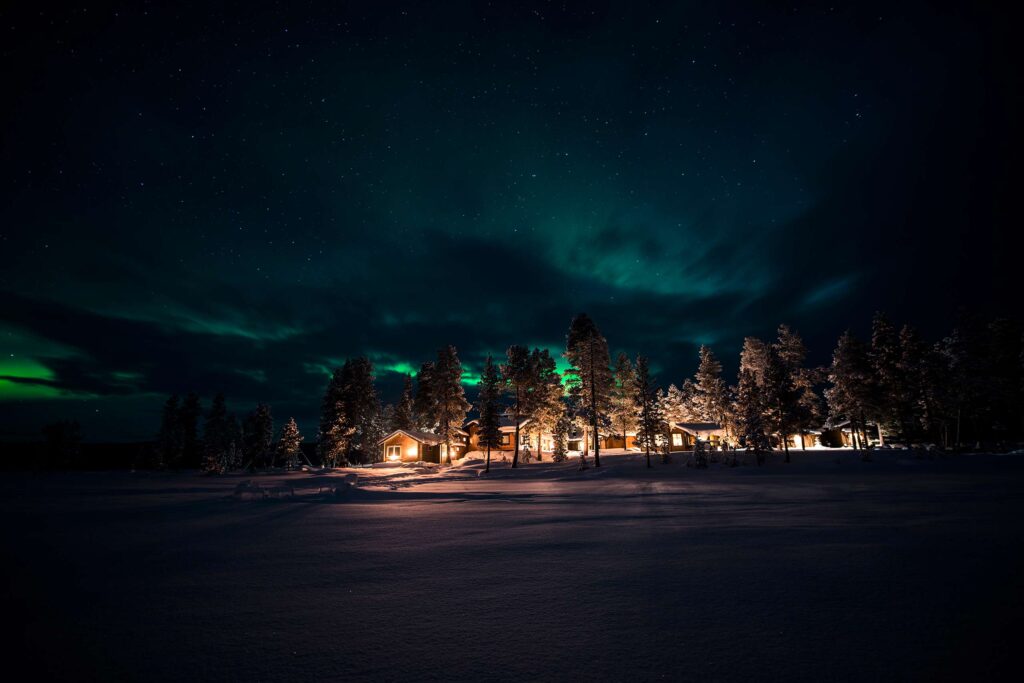 Northern Lights in the skies above Fjellborg Arctic Lodge, Swedish Lapland, Sweden