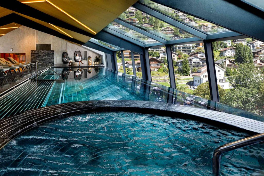 Jacuzzi and rooftop pool at Kempinski Palace Engelberg, Engelberg, Switzerland